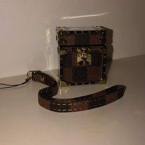 Brown checkered AirPod case
